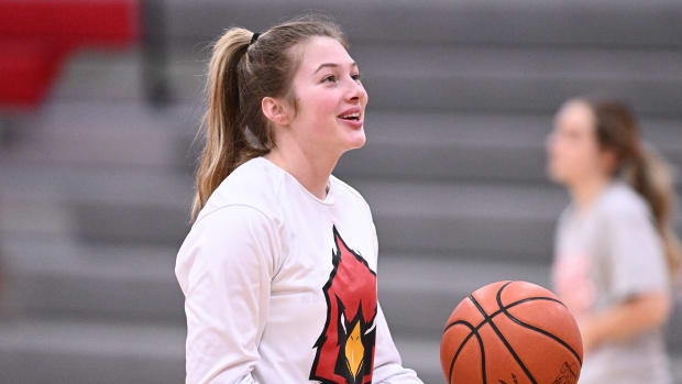Loudonville's Corri Vermilya laughs during warmups prior to a game against Ellet on February 7, 2023.